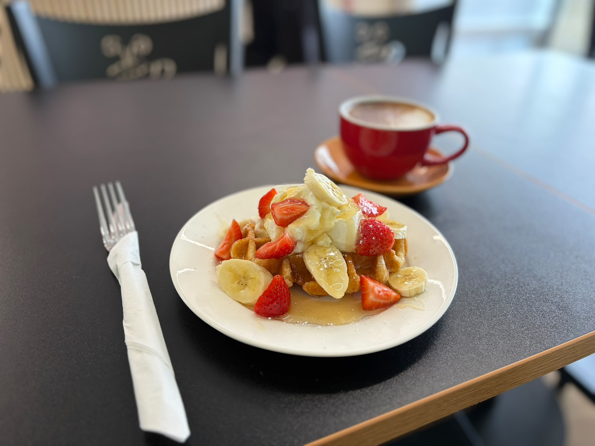 Fresh waffle with strawberries and banana